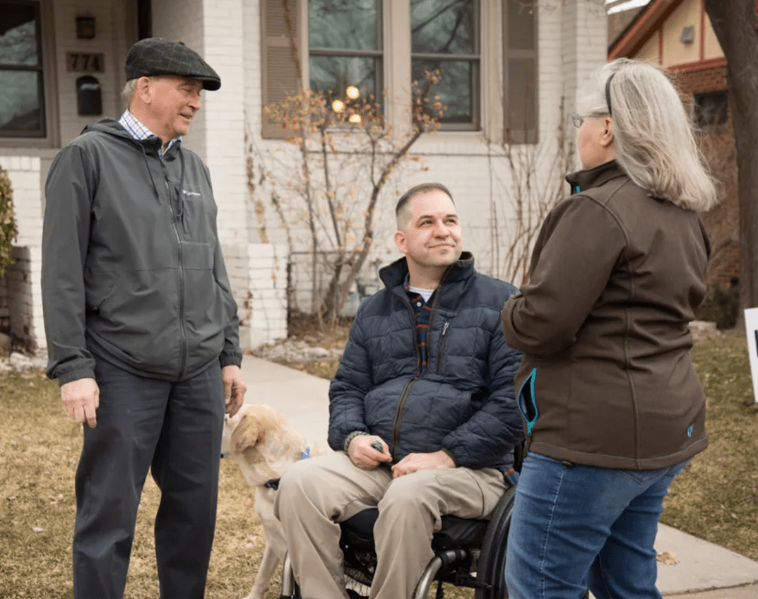 Chris talking with constituents