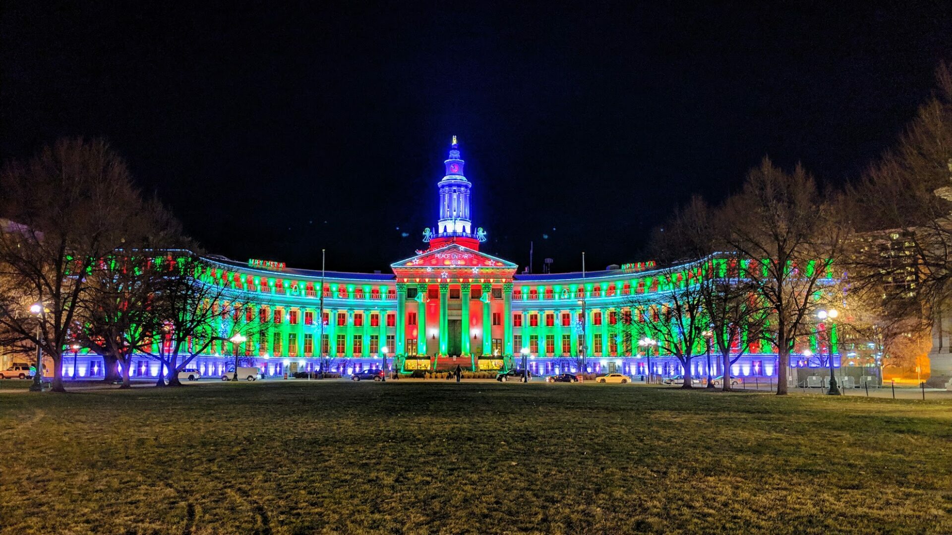 City and County of Denver building lit up at night time