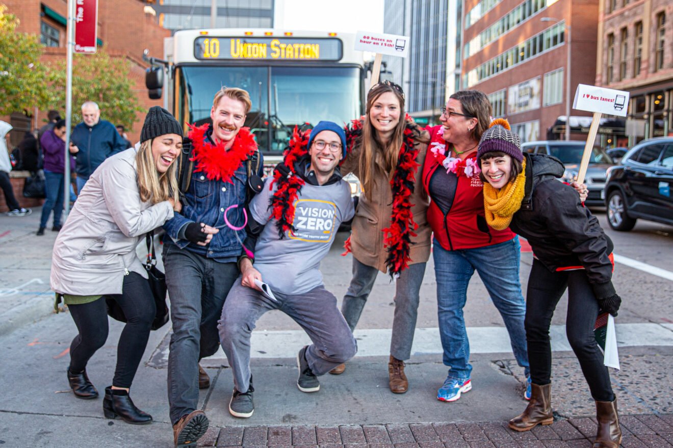 Denver Streets Partnership advocates in front of the RTD 10 bus
