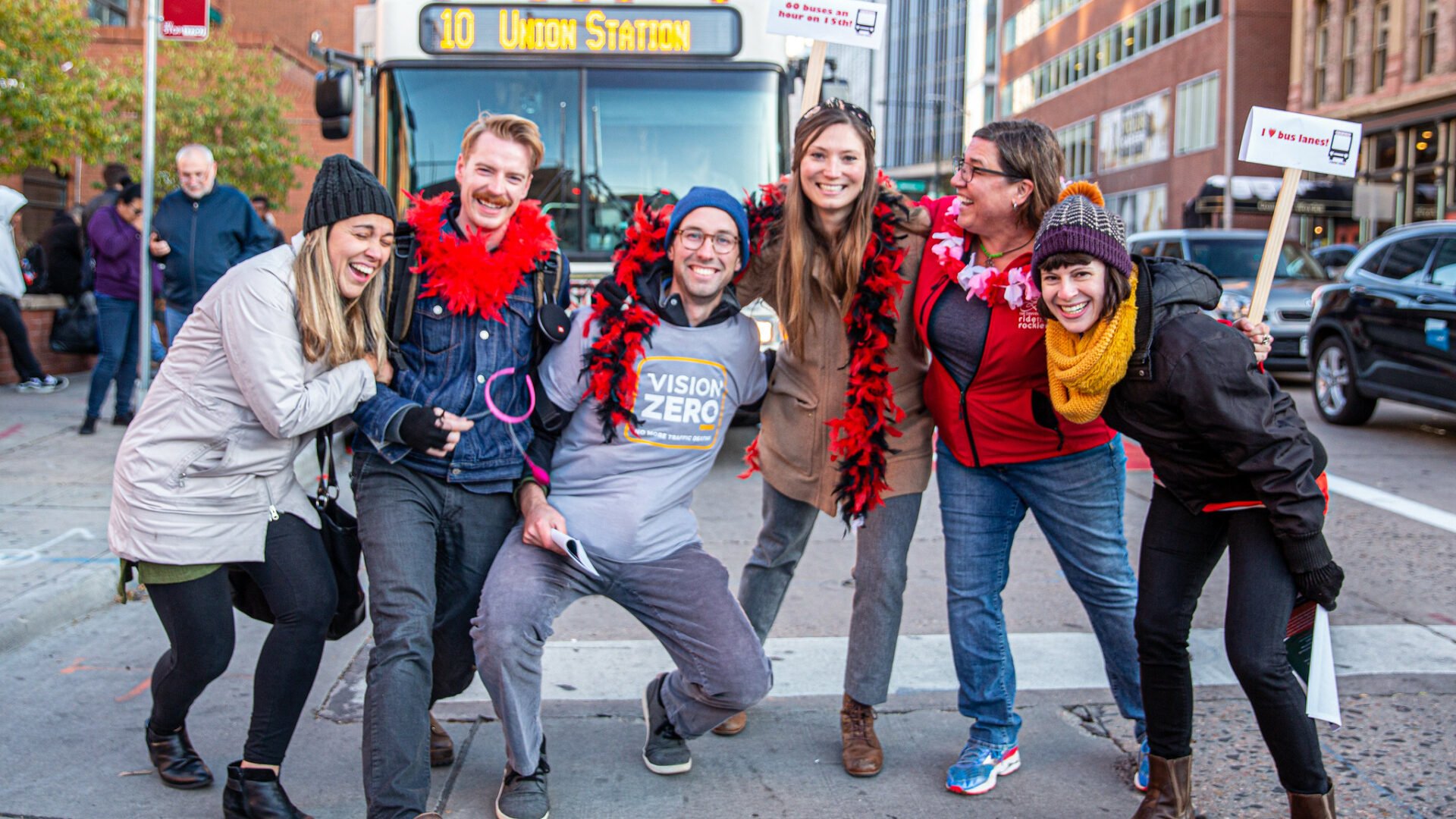 Denver Streets Partnership advocates in front of the RTD 10 bus