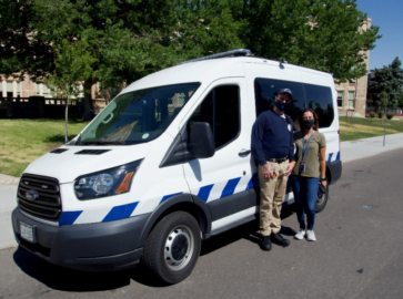 Photo of STAR van with 2 STAR members in front