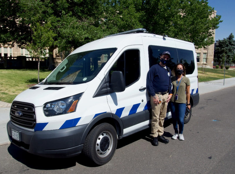 Photo of STAR van with 2 STAR members in front