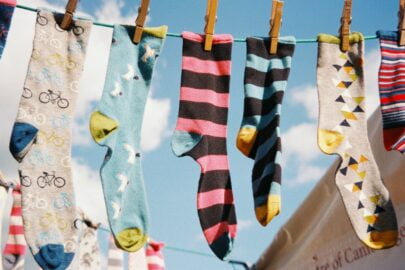 Stock photo of mismatched socks hanging on a clothesline